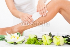 Beautician_Waxing_A_Womans_Leg.jpg